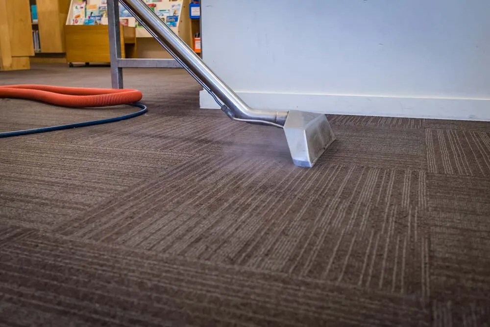 Commercial carpet cleaning in progress
